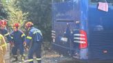 At least one dead after tourist coach crashes with lorry at Greek island