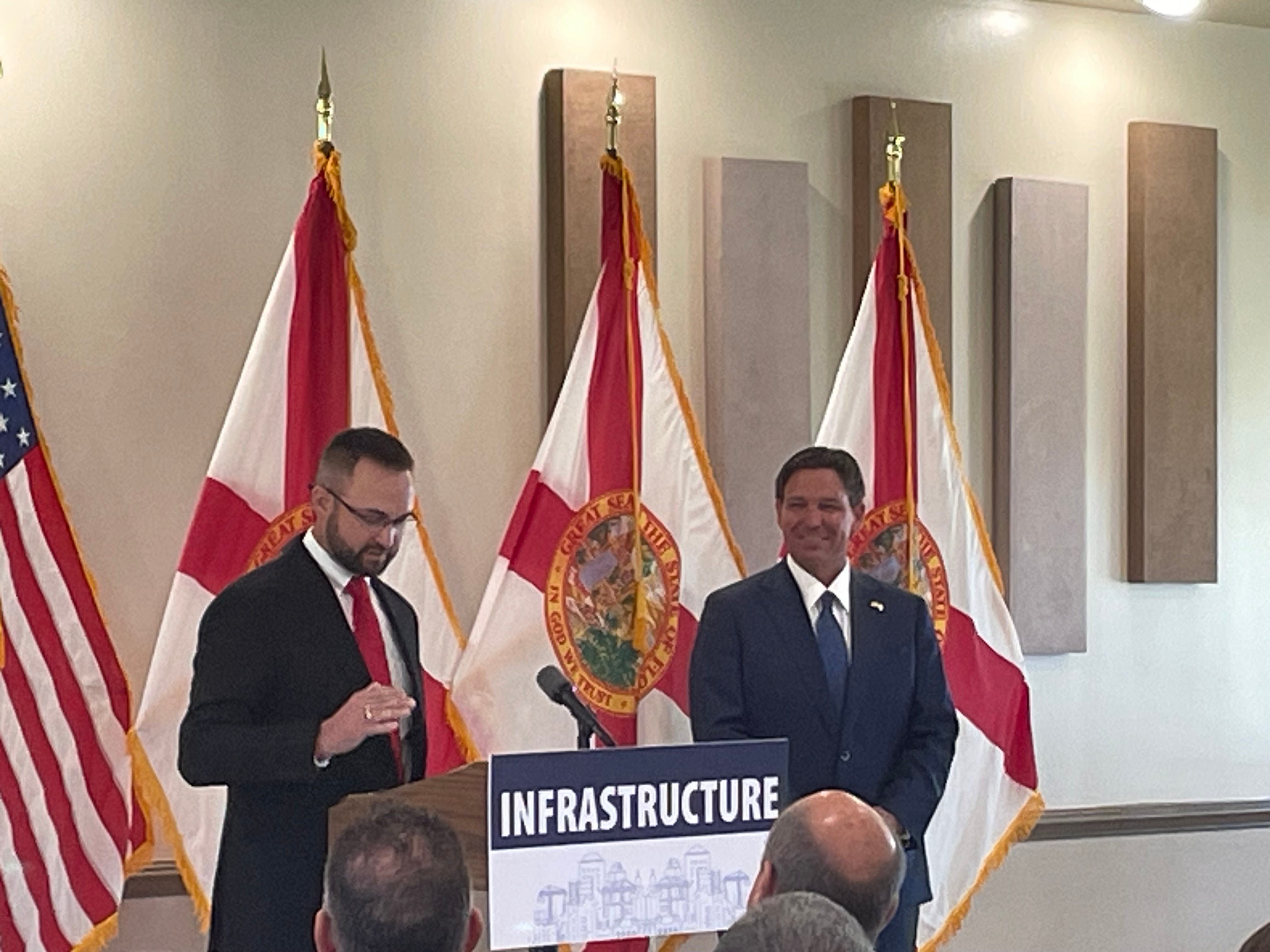 Gov. Ron DeSantis visits Umatilla bearing gifts and honoring a WW II veteran