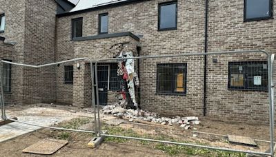 Man injured and property damaged after taxi crashes into house in Cardiff