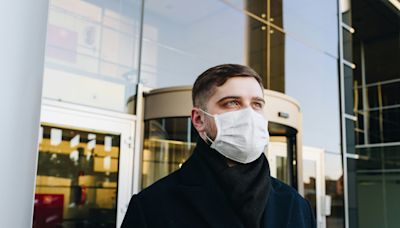 Wearing a face mask in public spaces cuts risk of common respiratory symptoms, suggests Norway study