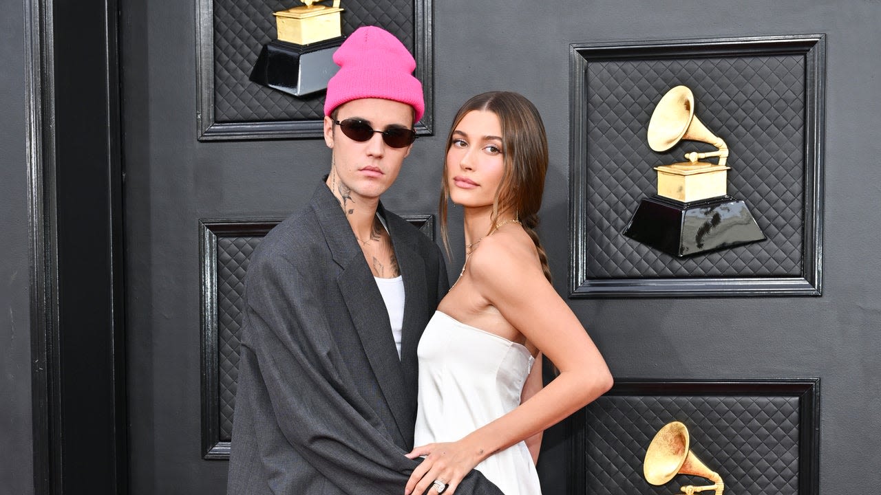 Justin Bieber Holds Pregnant Wife Hailey Bieber's Belly in Sweet PDA Video