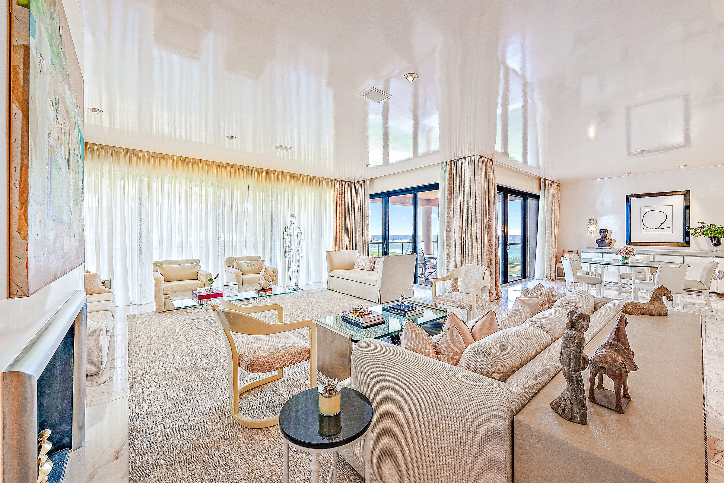 Listed in Palm Beach: Private terraces offer sea, golf-course views at Breakers Row condo