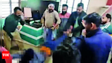 Assault video from 2021 goes viral, 2 held - Times of India
