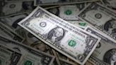 US dollar firms as inflation data backs Fed hike; yen plunges