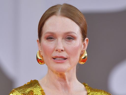 Julianne Moore shines in golden plunging gown at The Room Next Door premiere