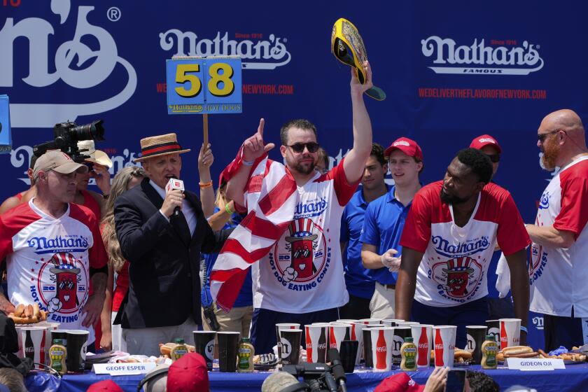 With Joey Chestnut out, Patrick Bertoletti wins Nathan's hot dog eating contest