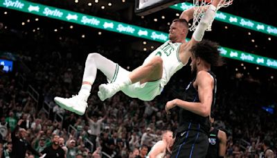 Brown has 22, Porzingis returns with 20 as Celtics open NBA Finals with 107-89 win over Mavericks
