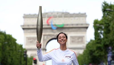 Who is carrying the Olympic torch through Paris? A BTS star, a garbage collector and more