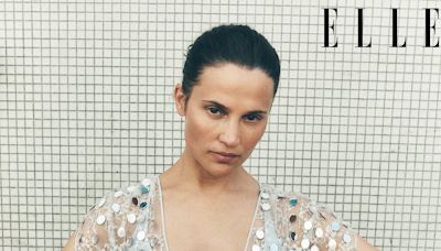 Alicia Vikander wows in a grey bra in a striking shoot for ELLE UK