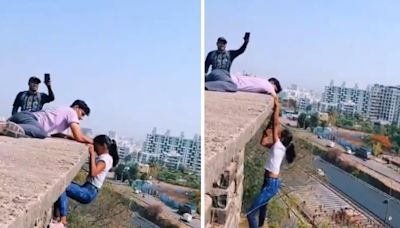 ‘All That For A Reel?’ Pune Girl Hangs From The Edge Of A Building In Viral Video - News18