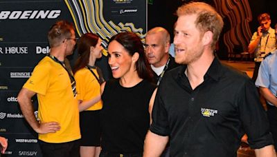 Prince Harry 'Follows Behind His Wife' Meghan Markle at LAX as the Duchess 'Takes Care of Business'