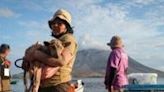 Rescuers brave Indonesia volcano eruptions to save pets