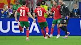 Tears turn to cheers for Ronaldo as Portugal sink Slovenia in a shoot-out