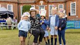 Former hat maker to the Queen enjoys display at school