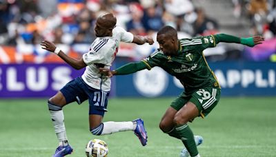 Whitecaps tie Timbers 1-1, clinch playoff berth