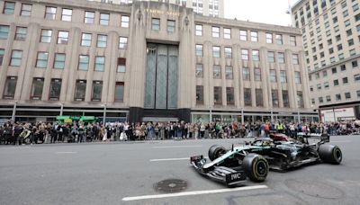 F1 driver Lewis Hamilton does donuts on New York City streets