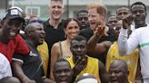 Meghan mobbed by fans as Harry 'copies' William on Nigeria tour