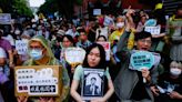 Tens of thousands protest against contentious Taiwan parliament reforms