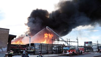 No injuries reported in massive fire at pallet company in West Town