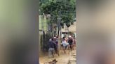 Locals form human chain to save baby after torrential floods in Sao Paulo state