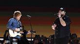 Ed Sheeran & Luke Combs Team Up for Heartfelt ‘Life Goes On’ Duet at 2023 ACM Awards