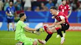 Georgia stun Portugal to advance to knockout stages
