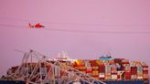 Baltimore's biggest bridge collapses after being hit by a cargo ship, videos show. Mass casualty event declared.