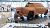 Report: EV maker Rivian plans to cut hundreds of jobs