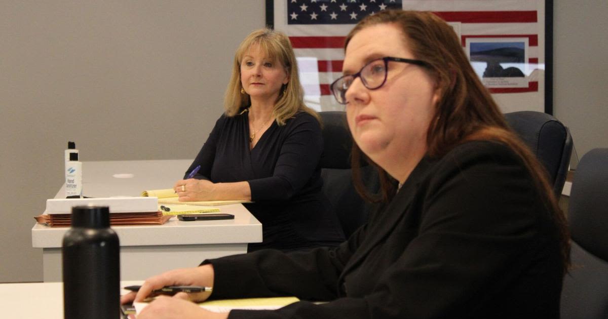 Cobb County Commission candidate Alicia Adams watches as her attorney argues against her disqualification in a hearing over the residency challenge brought by Mindy Seger on Friday, March 15, 2024, in Marietta.