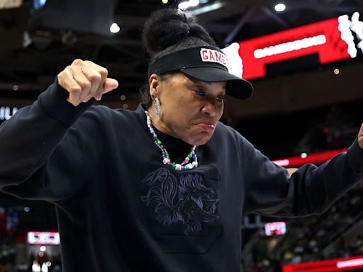 Definition of real: Dawn Staley shares stage with Plies at concert