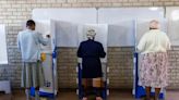 South Africans vote in a pivotal election as president says he has no doubt his ANC party will win