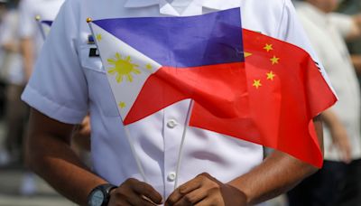 China and the Philippines reach deal in effort to stop clashes at fiercely disputed shoal