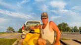 Man paddles 846-pound pumpkin on Missouri River to set world record. They call him 'Cinderfella'