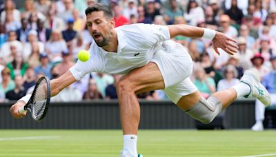 Novak Djokovic grinds out victory over wild card Jacob Fearnley at Wimbledon