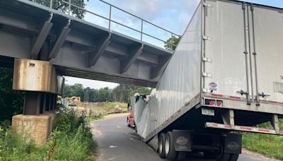 Semi crushed in collision with Cottage Grove bridge near Grey Cloud Island