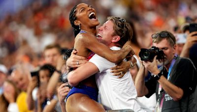 Tara Davis-Woodhall ‘Almost Blacked Out’ When She Lept Into Husband Hunter’s Arms After Winning Gold