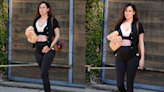 Rumer Willis shows off her growing baby bump in chic athleisure look