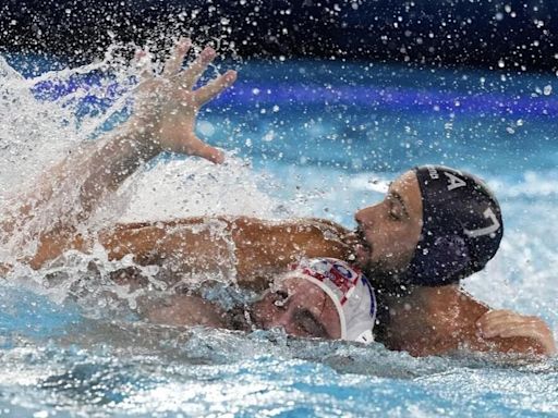 Water polo players wrestle for position at Olympics, but there is a line that rarely gets crossed