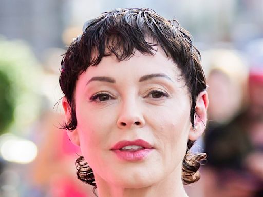 Rose McGowan stuns in a black jumpsuit as she attends party in Berlin