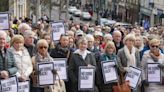 Crowds gather in Omagh to demand end to violence after police officer’s shooting