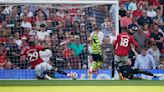 Arsenal beats Man United 1-0 to take title race with Man City to final day of Premier League season