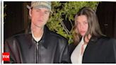 Justin Bieber cradles Hailey Bieber's baby bump as they pack on the PDA in new post; singer turns off comments | - Times of India