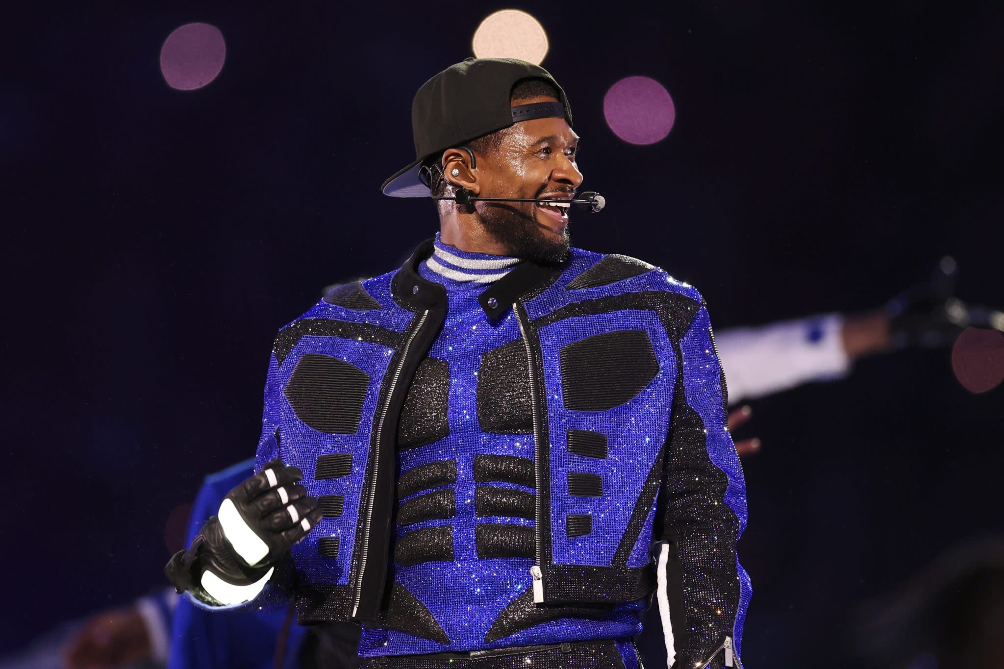 Usher and Apple CEO Tim Cook had a meeting. Now the Super Bowl performer is taking his ideas to Capitol Hill