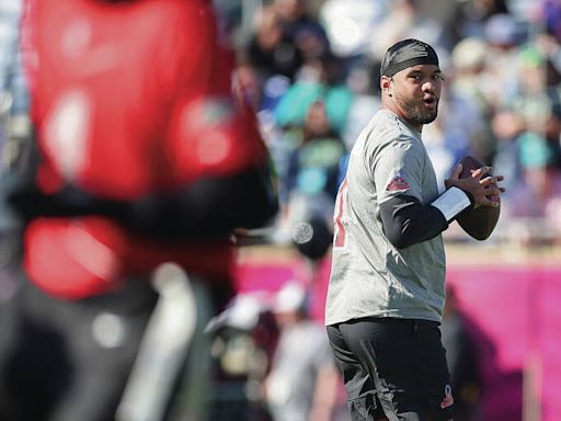 Contract dispute aside, Tua shows up for Dolphins OTAs | Honolulu Star-Advertiser