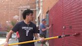 Volunteers clean up Burlington graffiti to make way for new murals