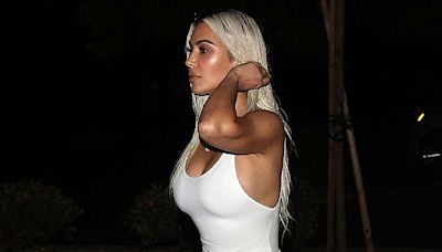 Kim Kardashian showcases her curves in white bodysuit for grocery trip