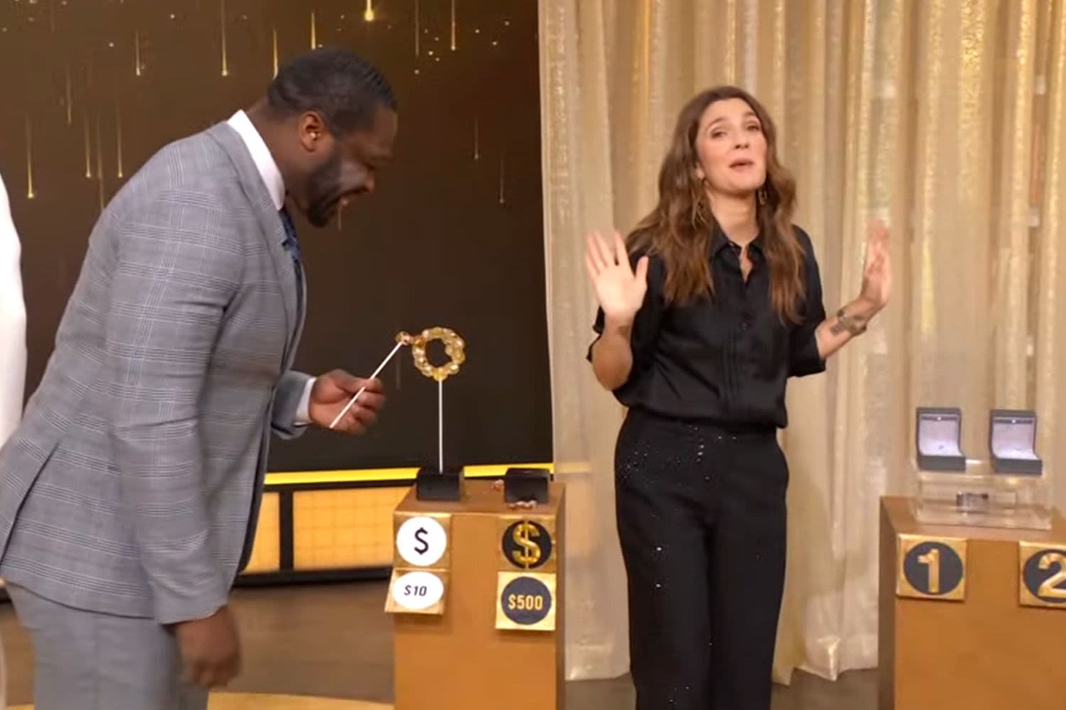 Drew Barrymore pauses talk show game to eat $500 lollipop off floor: 'Judge me all you want!'