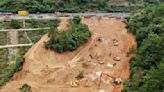 Death toll jumps to at least 48 as the search continues in southern China highway collapse