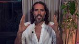 Russell Brand pleads with fans to support him financially after YouTube cuts his advert revenue