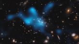 Galaxy cluster spied forming in early universe (photos, video)